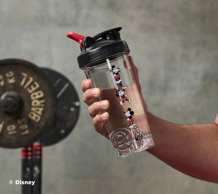 pro-series-a2 Mickey_Mouse_Protein_Shaker_Bottle_Being_Held_In_the_Gym.jpg